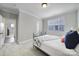 Bedroom with an abundance of natural light, neutral walls and a cozy ambiance at 11216 Preservation Ln, Charlotte, NC 28278