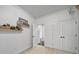 Cozy bedroom featuring neutral walls, a closet, and a small shelf for toys and decorations, offering a serene space at 11216 Preservation Ln, Charlotte, NC 28278