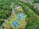 Aerial view of community amenities including tennis courts, and basketball court at 11216 Preservation Ln, Charlotte, NC 28278