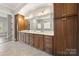 Spacious bathroom vanity offers ample storage and counter space, complemented by modern fixtures and lighting at 1152 Grand Oak Dr, Waxhaw, NC 28173