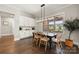 Cozy dining area features built-in cabinets and a large window overlooking the backyard at 1152 Grand Oak Dr, Waxhaw, NC 28173