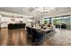 Open-concept living area with hardwood floors and seamless access to the kitchen at 1152 Grand Oak Dr, Waxhaw, NC 28173