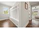 Well-organized mudroom with built-in cubbies, drawers, and a window at 1152 Grand Oak Dr, Waxhaw, NC 28173