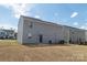 Spacious backyard with patio, perfect for entertaining and outdoor activities at 116 Crownpiece St, Troutman, NC 28166