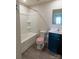 Full bathroom with modern sink, shower, and commode at 116 Crownpiece St, Troutman, NC 28166