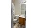 Cozy bathroom with a floral shower curtain and vanity at 12238 Paperbark Cir, Charlotte, NC 28277