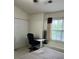 Bedroom includes a desk, closet, and natural light at 12238 Paperbark Cir, Charlotte, NC 28277