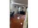 Bright and airy living room featuring hardwood floors and a ceiling fan at 12238 Paperbark Cir, Charlotte, NC 28277