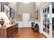 Elegant foyer with hardwood floors, decorative molding, and ample natural light at 12517 Pine Terrace Ct, Charlotte, NC 28273