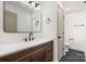 Modern bathroom with stylish vanity, sink, mirror, and contemporary finishes at 130 Valley Glen Dr, Troutman, NC 28166