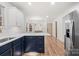 Well-designed kitchen with white countertops, dark cabinets, and stainless steel appliances at 130 Valley Glen Dr, Troutman, NC 28166