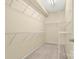 Walk-in closet with shelving for optimal storage and organization at 14853 Santa Lucia Dr, Charlotte, NC 28277