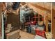 Unfinished attic storage space with exposed rafters and utilities, offering expansion potential at 16425 Spruell St, Huntersville, NC 28078