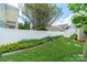 Spacious backyard with pristine fence and green landscape, offering an outdoor space for relaxation at 16425 Spruell St, Huntersville, NC 28078