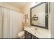 Neutral bathroom features a vanity with sink and shower with tub at 16425 Spruell St, Huntersville, NC 28078