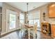 Bright dining area featuring natural light, a charming table setting, and elegant decor, creating a welcoming atmosphere at 16425 Spruell St, Huntersville, NC 28078