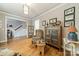 Charming living room with hardwood floors and neutral walls, creating a bright, airy feel with views to adjacent staircase at 16425 Spruell St, Huntersville, NC 28078
