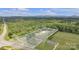 Aerial view of the property with boundary lines, lush greenery, and surrounding trees at 1770 Nc 90 W Hwy, Taylorsville, NC 28681