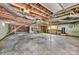 Unfinished basement with exposed pipes and concrete floor at 1770 Nc 90 W Hwy, Taylorsville, NC 28681