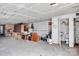Unfinished basement with concrete floors, utility hookups, and potential for customization at 1770 Nc 90 W Hwy, Taylorsville, NC 28681