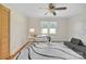 Well-lit bedroom with hardwood floors, an area rug, and a ceiling fan at 1770 Nc 90 W Hwy, Taylorsville, NC 28681