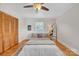 Cozy bedroom with hardwood floors, a wooden closet, and bright, natural light at 1770 Nc 90 W Hwy, Taylorsville, NC 28681