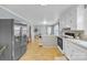 Spacious kitchen with stainless steel appliances offering a seamless flow into the living area at 1770 Nc 90 W Hwy, Taylorsville, NC 28681