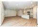Open concept living space with breakfast bar and lots of natural light at 1983 Paddlewheel Dr, Stanley, NC 28164
