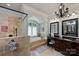 Luxurious bathroom with a glass-enclosed shower, soaking tub, and dual vanities at 2004 Garden View Ln, Weddington, NC 28104