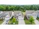 Aerial view of a well-maintained home with a large yard and mature trees at 2104 New Hope Branch Way, Belmont, NC 28012