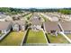 A residential area showcasing homes with ample green space and manicured lawns at 2104 New Hope Branch Way, Belmont, NC 28012