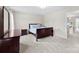 Inviting bedroom with ample natural light, neutral walls, and comfortable furnishings at 2104 New Hope Branch Way, Belmont, NC 28012