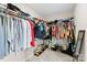 Walk-in closet offering ample storage with shelving, hanging rods and neat organization at 2104 New Hope Branch Way, Belmont, NC 28012