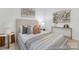 Tastefully decorated bedroom features stylish bedding, soft carpet, and modern decor, creating a cozy and inviting space at 219 Tillery Ln # 755, Mount Gilead, NC 27306