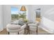 Cozy breakfast nook with a glass table, comfortable chairs, and lots of natural light at 219 Tillery Ln # 755, Mount Gilead, NC 27306