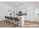 Bright kitchen with white cabinetry, a quartz countertop island, and stainless steel appliances at 219 Tillery Ln # 755, Mount Gilead, NC 27306