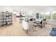 Open-concept living area with modern decor, plush seating, and seamlessly connected to kitchen and dining space at 219 Tillery Ln # 755, Mount Gilead, NC 27306