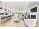 Bright open-concept living room features a fireplace, recessed lighting, and lots of windows at 219 Tillery Ln # 755, Mount Gilead, NC 27306