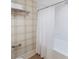 Bathroom with a shower and tub with tiled walls and modern fixtures at 2268 New Gray Rock Rd, Fort Mill, SC 29708