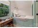 Charming bedroom with floral wallpaper, a built-in twin bed, and wood floors at 2268 New Gray Rock Rd, Fort Mill, SC 29708