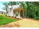 Home featuring a front porch, with green lawn and landscaped surroundings at 2268 New Gray Rock Rd, Fort Mill, SC 29708