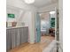 Hallway view of bedroom and built in cabinetry with adjacent laundry area at 2268 New Gray Rock Rd, Fort Mill, SC 29708