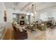 Beautiful living room with stone fireplace, beamed ceilings, and an open floor plan at 2268 New Gray Rock Rd, Fort Mill, SC 29708