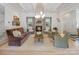 Cozy living room featuring a stone fireplace, comfortable seating, and elegant decor at 2268 New Gray Rock Rd, Fort Mill, SC 29708