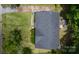 Bird's eye view of a house, showcasing its roof, yard, and surrounding trees and neighborhood at 2324 Knight Dr, Gastonia, NC 28052