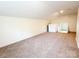 Bedroom that features a closet, carpeting, white walls, and an opening to another room at 2469 Elkwood Cir, Charlotte, NC 28205