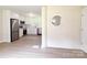 Spacious kitchen area open to dining, featuring stainless steel appliances at 2469 Elkwood Cir, Charlotte, NC 28205
