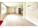Bright living room with light-colored flooring, lots of natural light, and access to the kitchen at 2469 Elkwood Cir, Charlotte, NC 28205