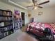 A well-lit bedroom featuring carpet flooring and colorful decor at 290 Greentree Dr, Rock Hill, SC 29730