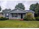 Charming single-story home featuring a well-maintained lawn and classic architectural details at 290 Greentree Dr, Rock Hill, SC 29730